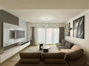 Stylish 1BR Condo with Pool, Gym, Parking & Wi-Fi